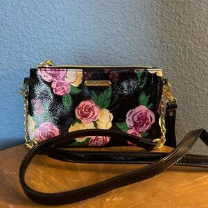 Betsy Johnson- Mint condition tea garden wet look purse.